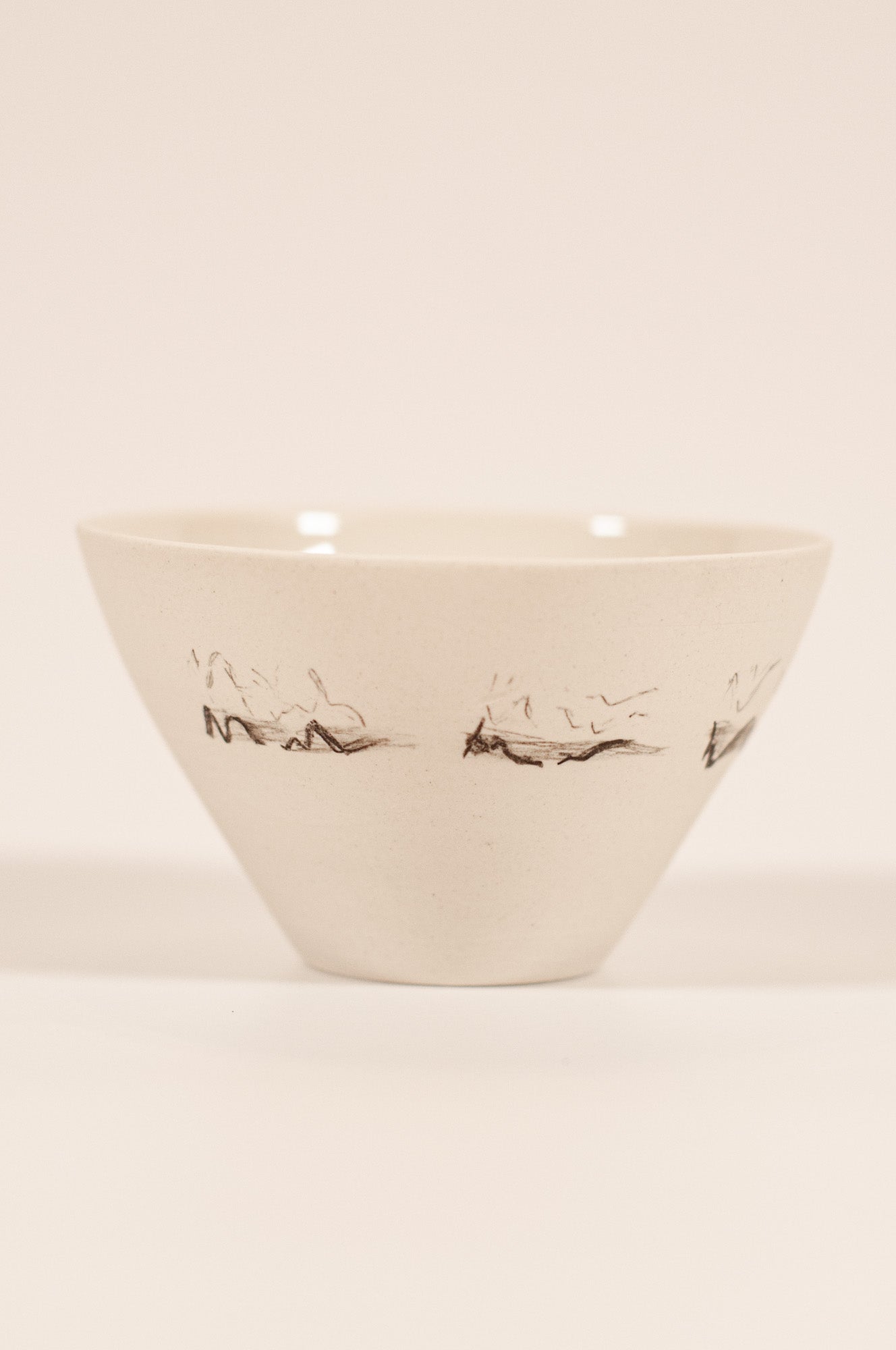 Artisan small porcelain bowl, hand-thrown, tactile polished surface, Canadian-made, Echo Collection with hand-drawn bird soundwave decoration