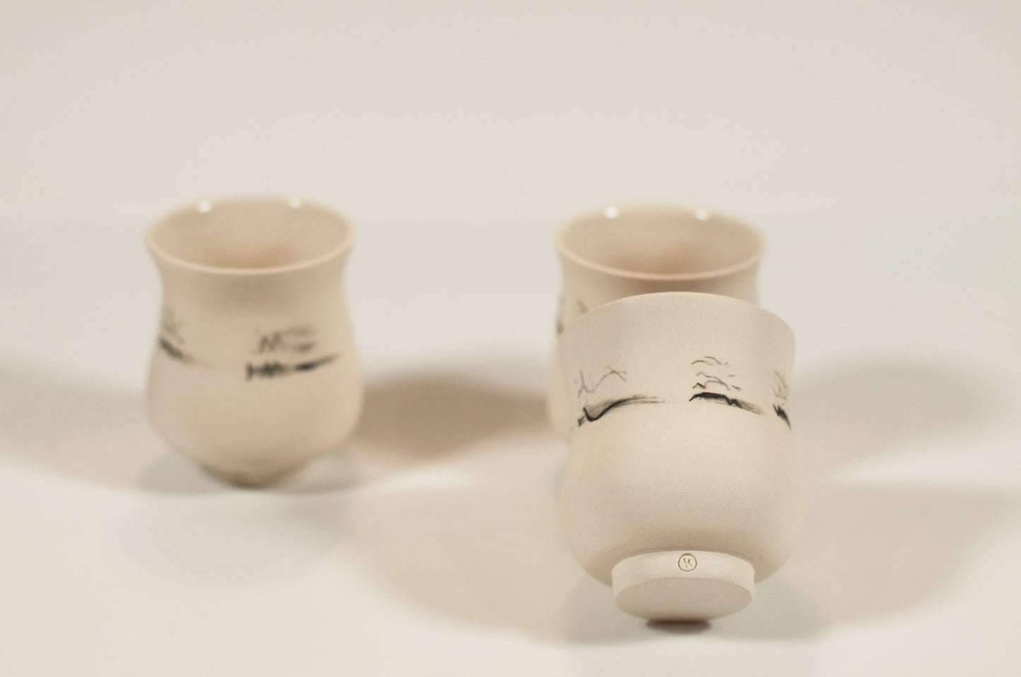 Hand-thrown small cup with glazed interior, part of Echo Collection Canadian ceramics