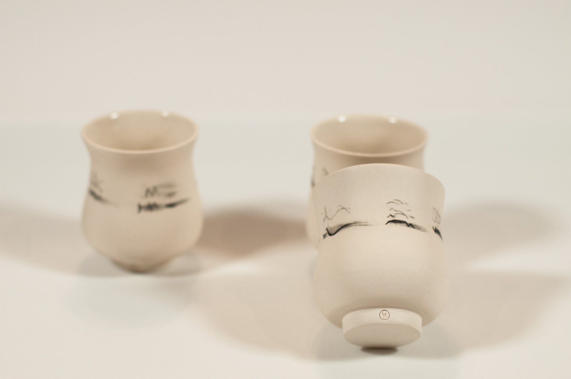 Hand-thrown small cup with glazed interior, part of Echo Collection Canadian ceramics