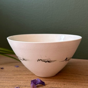 Handmade Canadian porcelain medium bowl from the Echo Collection, ideal for cereal or small snacks, polished silky smooth exterior, glazed food-safe interior, hand-thrown