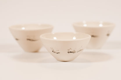Handmade small porcelain bowl, fits comfortably in the hand, glazed interior, polished exterior, Canadian-made, Echo Collection, bird soundwave design