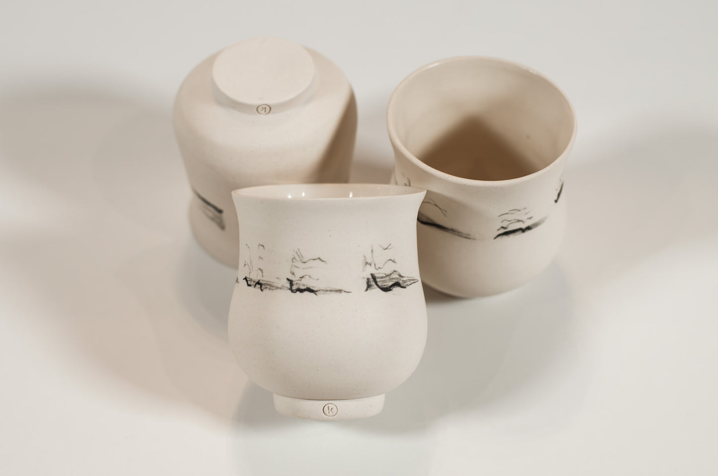 Echo Collection artisan porcelain cup, minimal design, polished exterior, 6 oz