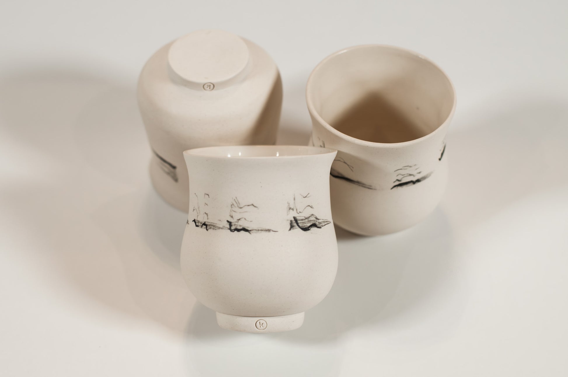 Echo Collection artisan porcelain cup, minimal design, polished exterior, 6 oz