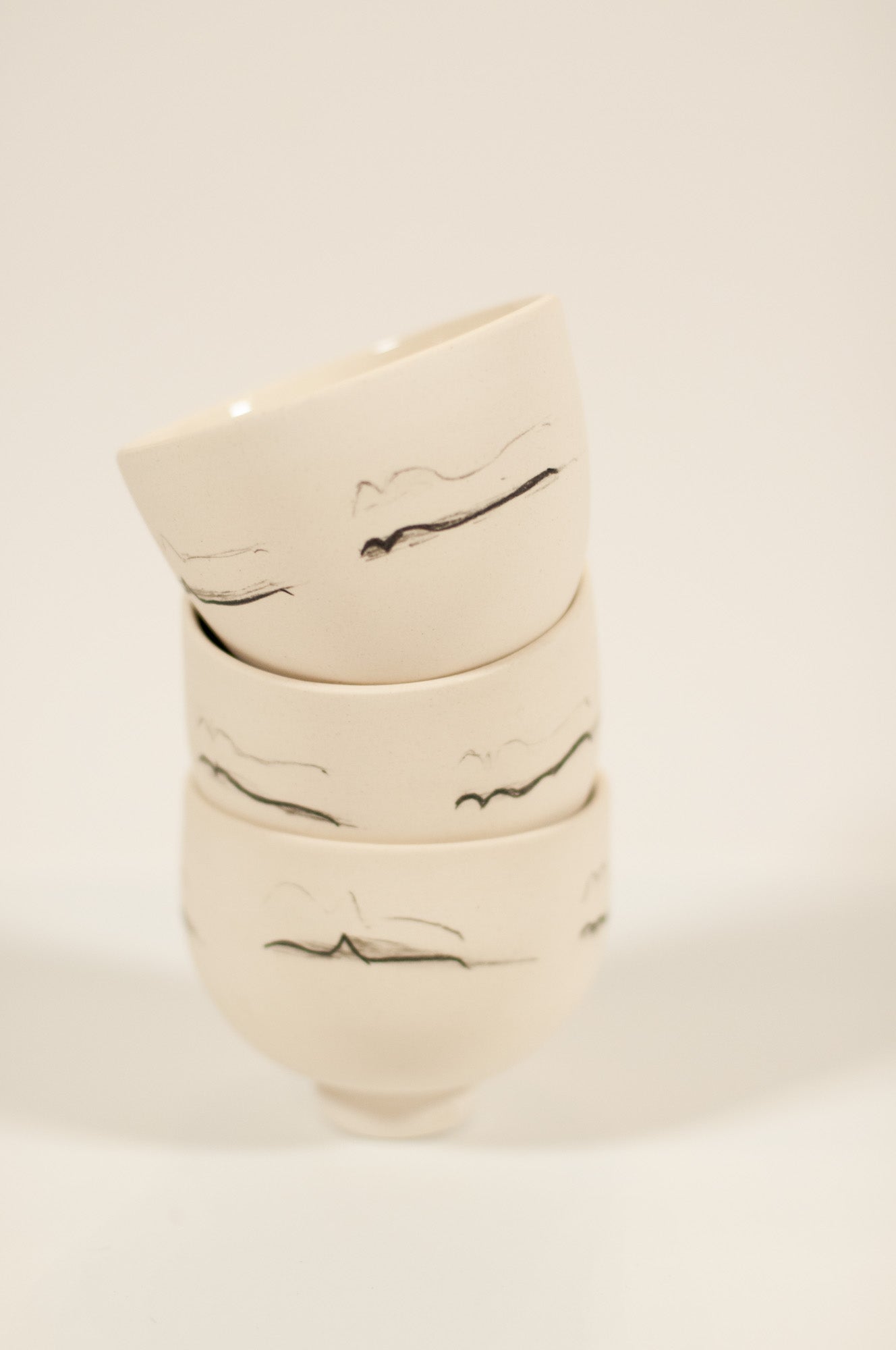 Wheel-thrown small ceramic tea cup, hand-decorated with Pewee soundwave, part of Echo Collection, Canadian-made